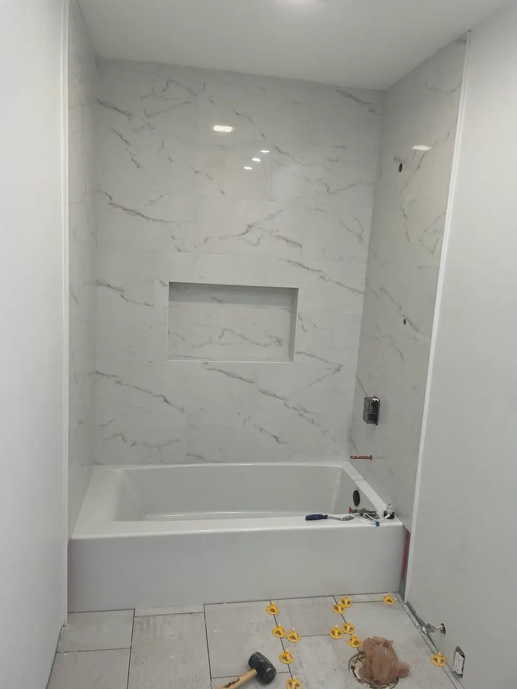 Bathroom remodeling in Evanston — floor tile installation by BeaverBuild near Chicago